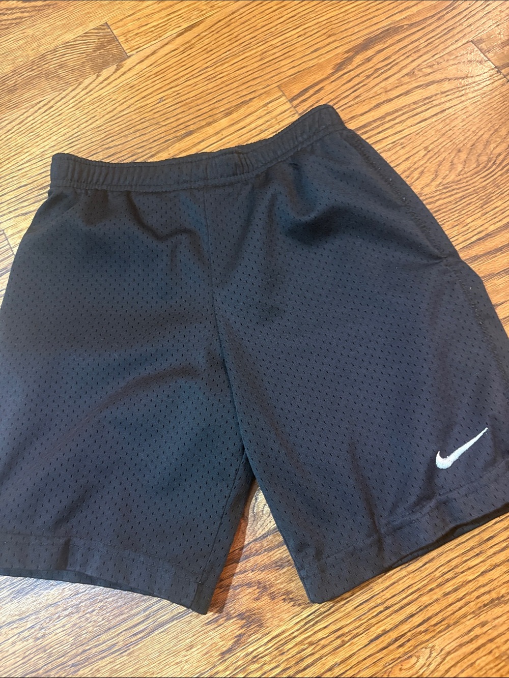 Nike Black Athletic Mesh Shorts with White Swoosh size 7
